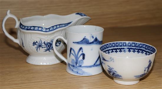 A Worcester blue and white sauceboat and a similar fisherman and cormorant teabowl c. 1770-90